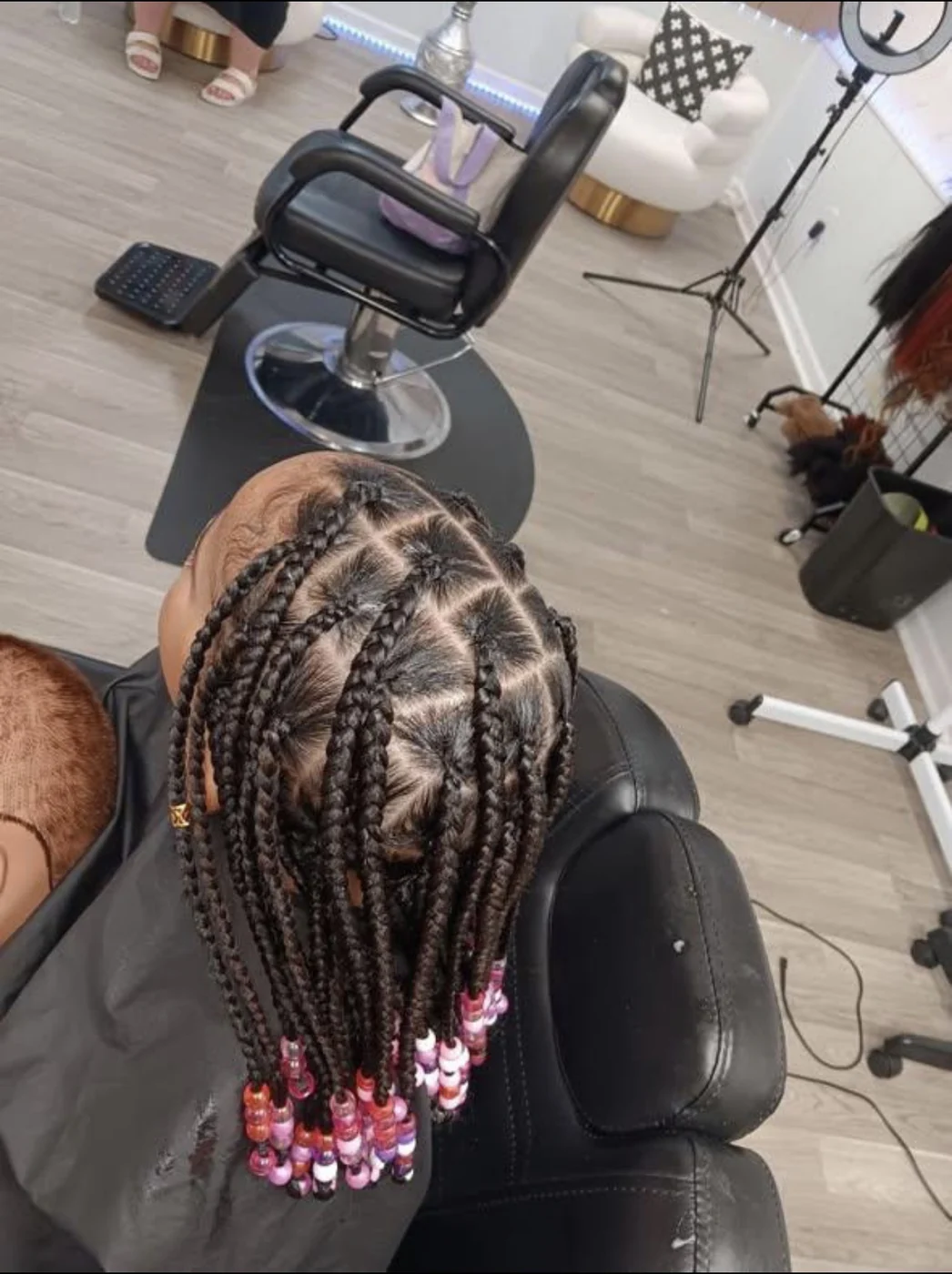 Kids braid style with colorful beads by Elegant African Braiding