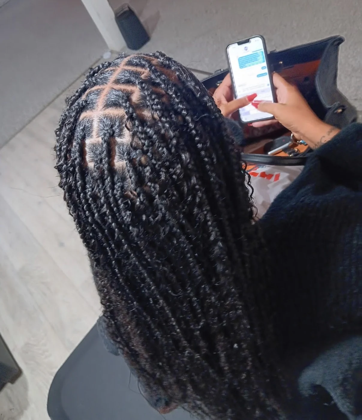 Close-up top view of knotless braids by Elegant African Braiding